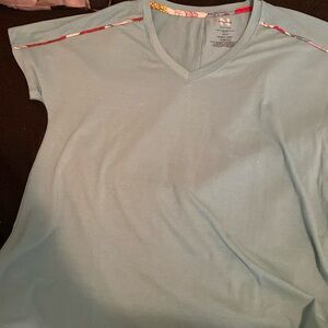 Large light blue vneck shirt .